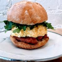 Mr. Victor Sandwich · Soft scrambled eggs, Edward's hickory smoked sausage, cheddar cheese and arugula on a Baltha...