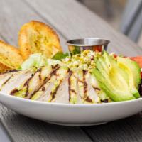 Signature Indulge Grilled Chicken Salad · Grilled chicken breast, European lettuce mix, tomatoes, cucumbers, red onions, avocado and f...