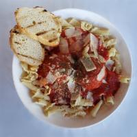 Pasta and Meatballs · Classic pasta and meatballs, with marinara sauce and shaved parmesan, served with crostini.