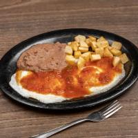 Huevos Rancheros Plate · Served with potatoes, beans, and two tortillas.