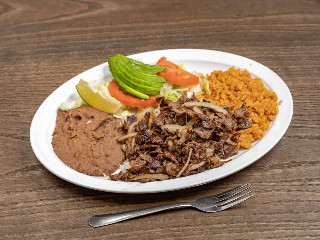 13. Fajitas Plate · Beef or chicken with avocado and pico de gallo. Comes with rice, beans, salad, and two homemade tortillas.

