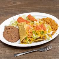 20. Texas Plate · 1 crispy taco, 1 bean, cheese chalupa, rice, and beans. Comes with rice, beans, salad, and t...