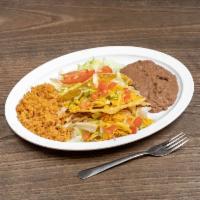 21. Crispy Taco Plate · 2 pieces. Beef or chicken. No mix. Served with rice and beans. Comes with rice, beans, salad...