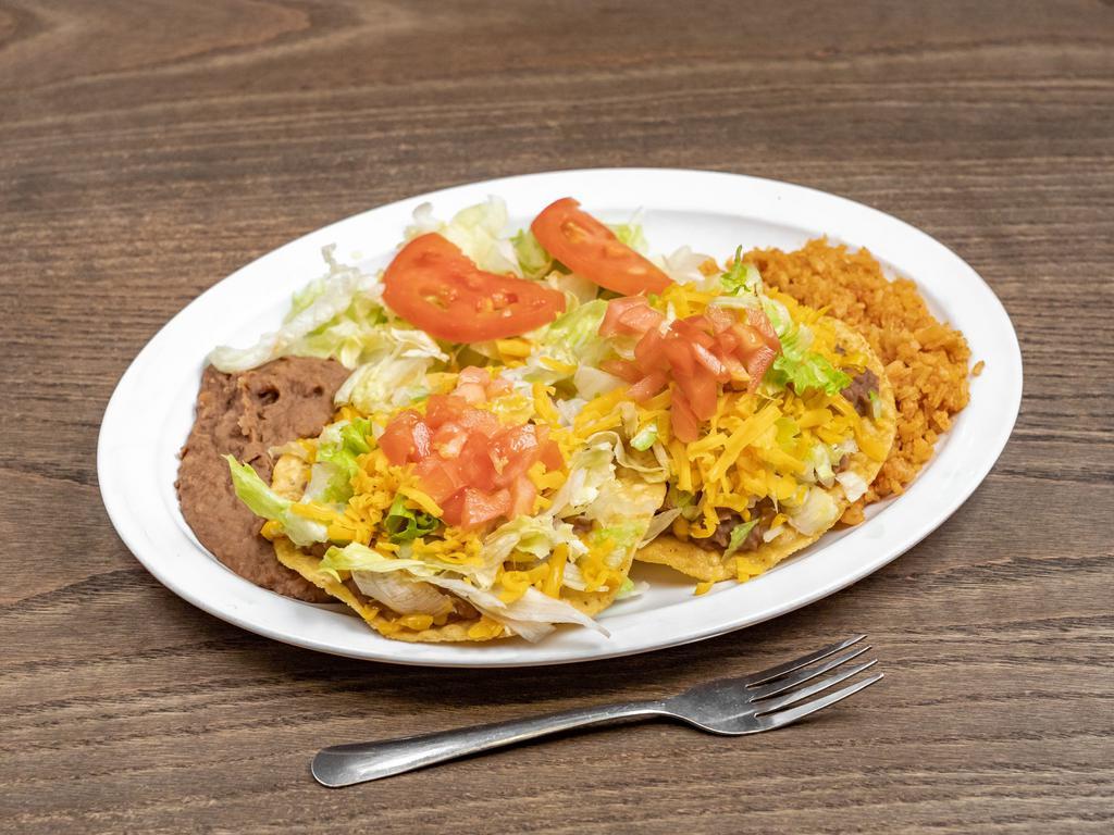 22. Chalupa Plate · 2 pieces. Tostadas. Beef, chicken, or beans. No mix. Chalupas served with rice and beans. Comes with rice, beans, salad, and two homemade tortillas.

