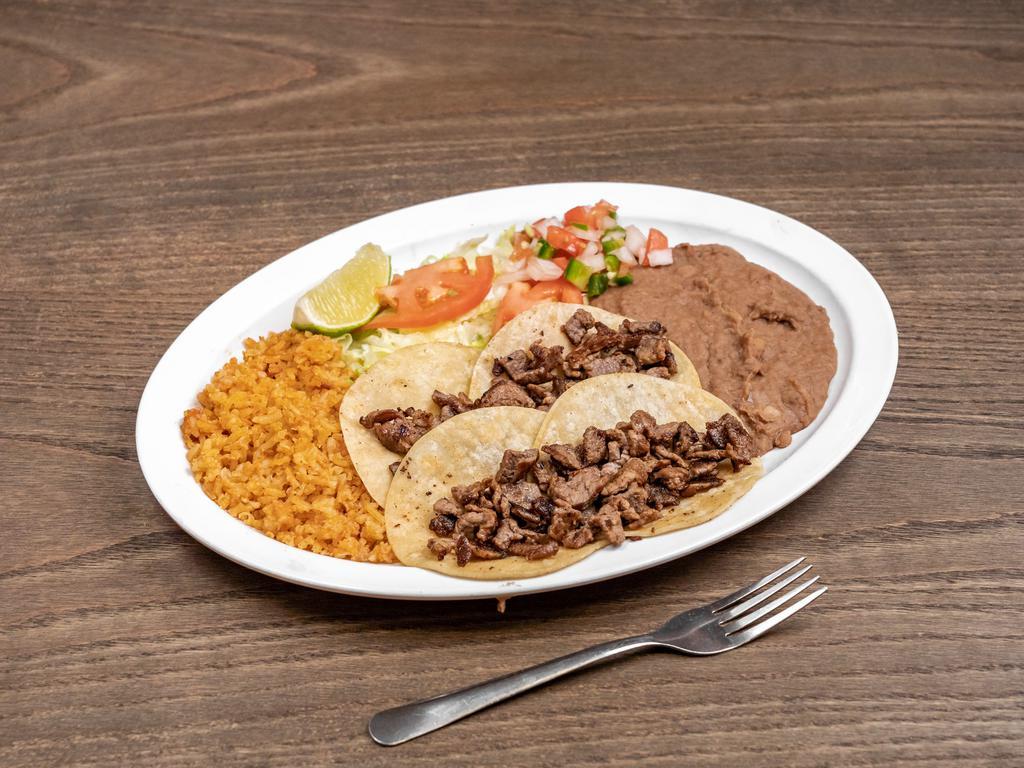 23. Mini Tacos Plate · Asada, barbacoa, or pastor. No mix. Served with rice and beans. Comes with rice, beans, salad, and two homemade tortillas.

