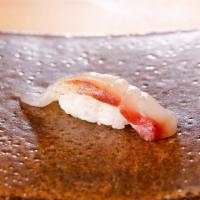 Hamachi Nigiri · Yellowtail. Served raw or undercooked or contain raw or undercooked ingredients. Consuming r...