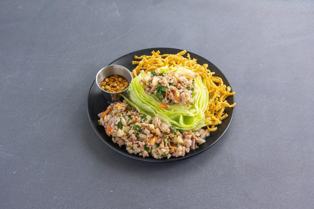 Lettuce Wrap · Minced pork topped with ginger and peanuts with tamarind sauce.