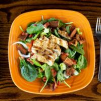 Spinach Chicken Salad · Fresh spinach and crisp romaine lettuce, tossed with tomatoes, onions and bacon. Topped with...