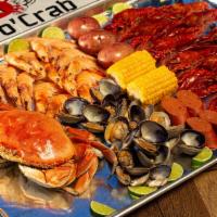 C4. Dungeness Crab Combo · Includes 1 lb. shrimp (Head On), 1 lb. clams, 1 lb. crawfish, 2 corns, 2 potatoes and 4 saus...