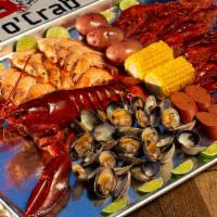 C4. Lobster Combo · Includes 1 lb. shrimp (Head On), 1 lb. clams, 1 lb. crawfish, 2 corns, 2 potatoes and 4 saus...