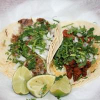 Small Taco · Onions, cilantro, and salsa.