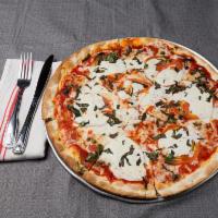 Medium Margherita Pizza · 8 slices. Fresh mozzarella, slicked plum tomato, and fresh basil.