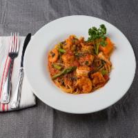 Linguine Piccolo Mondo Pasta · Baby shrimp, asparagus, tomato, and basil. Substitute gluten-free pasta for an additional ch...