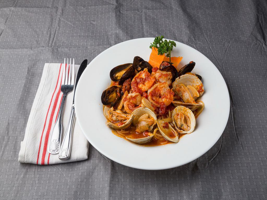 Linguine Marechiaro · Shrimp, clams, mussels, and light marinara sauce.