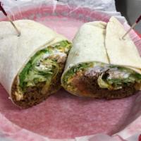 #12. Taco Wrap · Shredded lettuce, red onions, fresh ground beef, cheddar cheese, sour cream and tomato salsa...