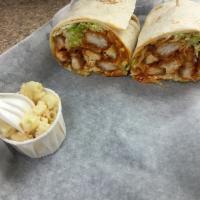 #14. Buffalo Chicken Wrap (Kate's Fav From TikTok) · Chicken tenders tossed in our homemade Buffalo sauce with lettuce, tomato and ranch dressing.