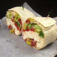 #26. Meatless Wrap · Fresh mozzarella, roasted peppers, sun dried tomatoes, romaine lettuce and red onions with a...