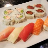 Sushi Combo C · 4 pcs California Roll, 4 pcs Spicy Tuna Roll, 1 pc of Tuna, Salmon, Shrimp, Izumidai & Escol...