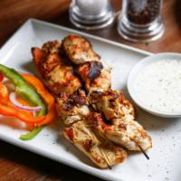 Mexican Espetada · Cubes of chicken skewered, flamed grilled and basted in your choice of peri peri sauce.