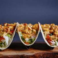 Chicken tacos · Marinated chicken in Portuguese Peri Peri sauce then flame grilled to order in your chosen s...