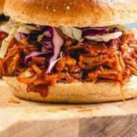 Z. BBQ Pulled Pork Sandwich · Served with caramelized onion, coleslaw, and hand cut potato chips.