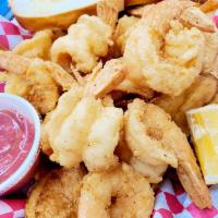 H. Jumbo Shrimps Basket · Served with hand cut potato chips, hush puppies, and garlic bread.