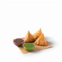 Samosas · 3 crispy pastries filled with potatoes, peas and spices. Served with coriander and tamarind ...