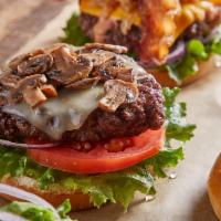 Mushroom Swiss Burger · Swiss cheese,  sauteed mushrooms, lettuce, tomato, red onion.