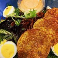 Fried Green Tomato Salad · Fresh chopped lettuce & spinach topped with fried green tomato, bacon crumbles, boiled eggs ...