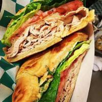 House Roasted Turkey Breast Sandwich · Slow roasted fresh turkey breast sliced thin with choice of bread, condiments, lettuce, toma...