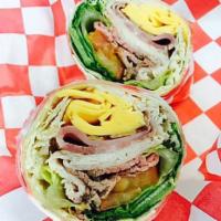 Barnyard Wrap · Our house-roasted, smoked & pit turkey, beef & ham, topped with honey mustard, fresh lettuce...