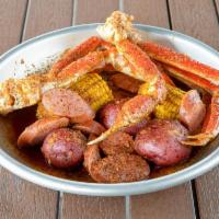 4. One lb. Snow Crab Legs and 1/2 lb. Sausage  · 