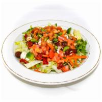 Mediterranean Salad (GF) · Garden spring mixed with tomatoes, onions, peppers, sun-dried
tomatoes, feta cheese & olives...