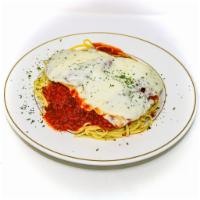 Chicken Parmigiana · Breaded chicken breast topped with marinara sauce & melted mozzarella cheese. Served over li...