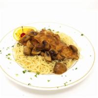 Chicken Marsala · Chicken breast sautéed with mushrooms in a marsala wine sauce. Served over linguine