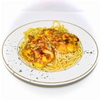 Filet of Sole Francaise · Dipped in egg, sautéed with lemon butter & wine sauce over linguini.