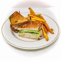 Tuna Melt Sandwich · Grilled rye bread with tuna salad, sliced tomatoes & melted american cheese