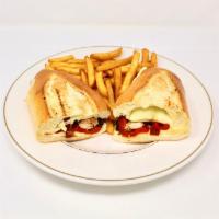 NY Grilled Chicken Sandwich · Grilled chicken breast, roasted peppers, sun-dried tomatoes & melted mozzarella cheese. Serv...