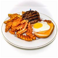 Chipotle Burger · 8 oz. Beef burger, bacon, red onions, fried egg, cheddar cheese & chipotle mayo. Served with...