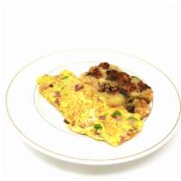 Western Omelette · Served with ham, peppers and onions.