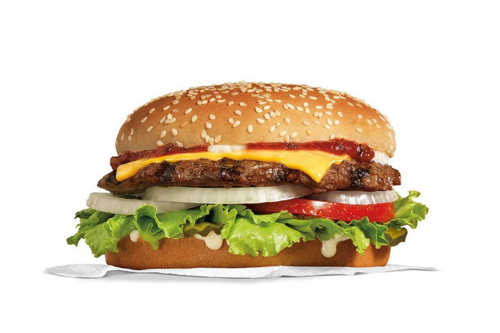 Famous Star® Burger with Cheese · Charbroiled all-beef patty, melted American cheese, lettuce, tomato, sliced onions, dill pickles, Special Sauce, and mayonnaise on a seeded bun. 

