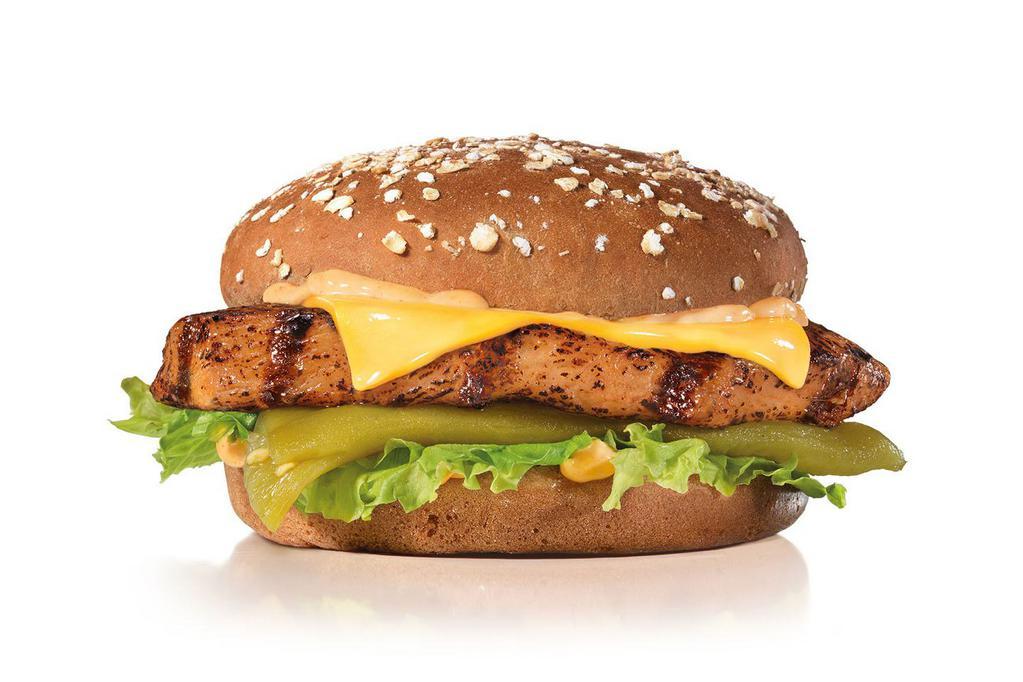 Charbroiled Santa Fe Chicken™ Sandwich · Charbroiled chicken breast, melted American cheese, mild green chile, lettuce and Santa Fe Sauce on a Potato Bun.

