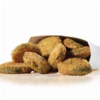 Fried Zucchini · Crispy bites of breaded zucchini. Served with house dressing.
