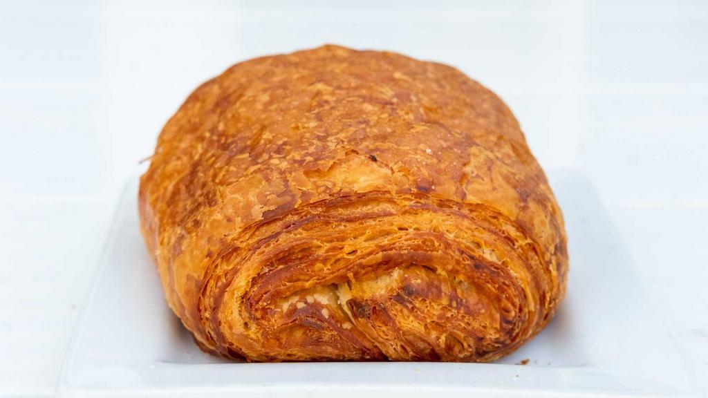 Pain au Chocolat · Our chocolate croissant has ultra thin layers that add to it's buttery layers, filled with chocolate.