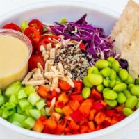 Quinoa and Veggie Salad · Quinoa, snap peas, edamame, cabbage, cucumber, red bellpepper, cherry tomatoes, cilantro, mi...