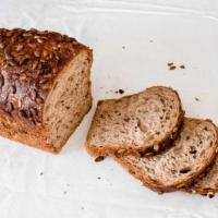 Sandwich Loaf · A choice of our housemade honey whole wheat loaf or our sourdough polenta loaf. Honey whole ...