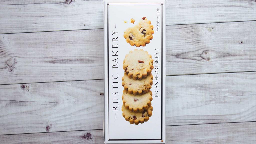 Pecan Shortbread Cookies, 4 oz. Box · 4 oz. box Rustic Bakery buttery shortbread cookies made with the perfect combination of creamy Straus butter, caramelized sugar, and nutty pecans. Made in small batches with organic ingredients. Simple and classic, these cookies are delicious with tea!
