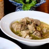 Stewed Pork Ribs · Stewed pork ribs, lemongrass, kaffir lime leaves, cilantro and chili, served with rice.