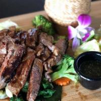 BBQ Beef · Grilled beef with Thai style spicy lime sauce.