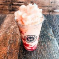 Fruity Booty  · Mango, strawberry, and peach flavored slushie with strawberry bits.
